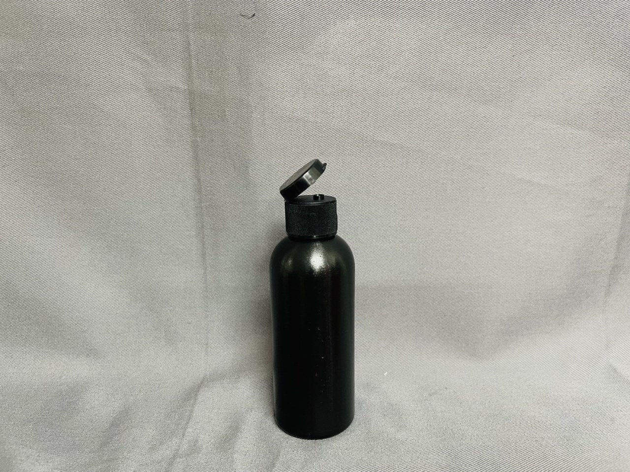 G-48黑色圓型掀蓋瓶100cc